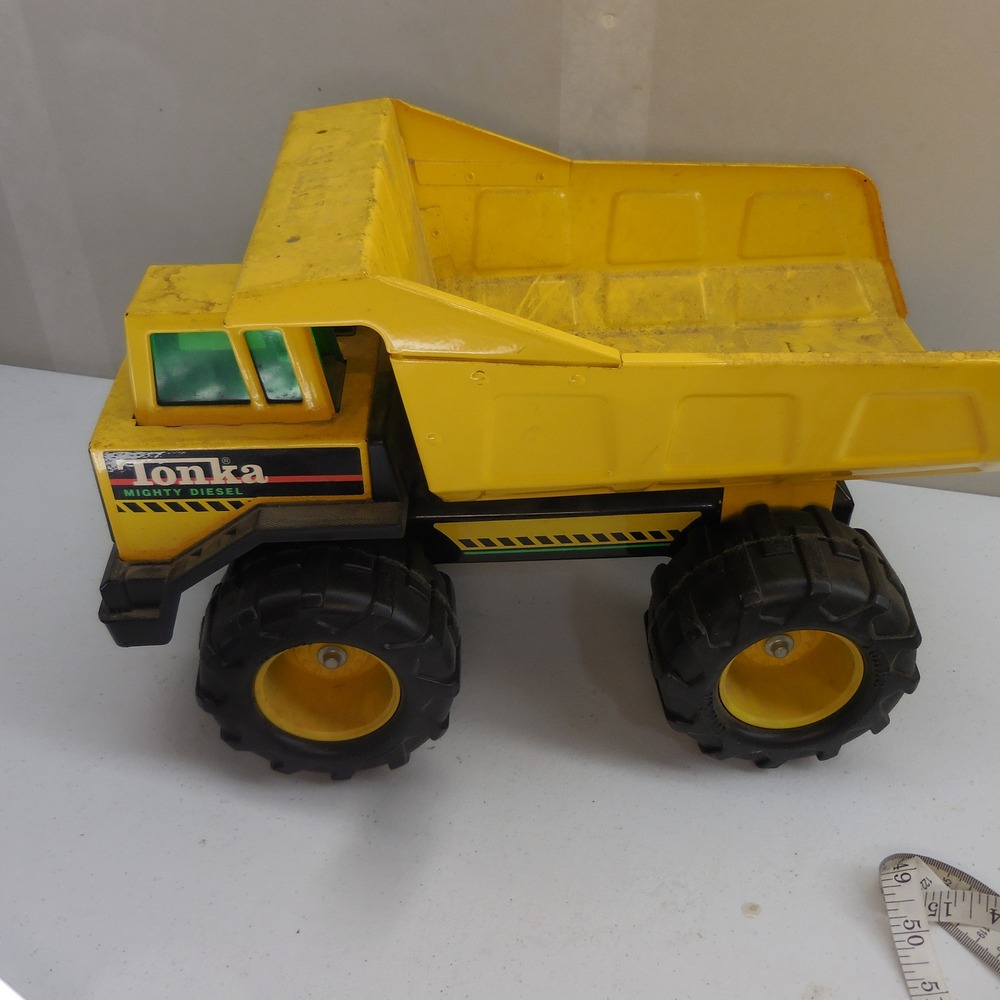 Vintage Tonka Mighty Diesel Dump Truck Yellow Pressed Steel Construction Toy
